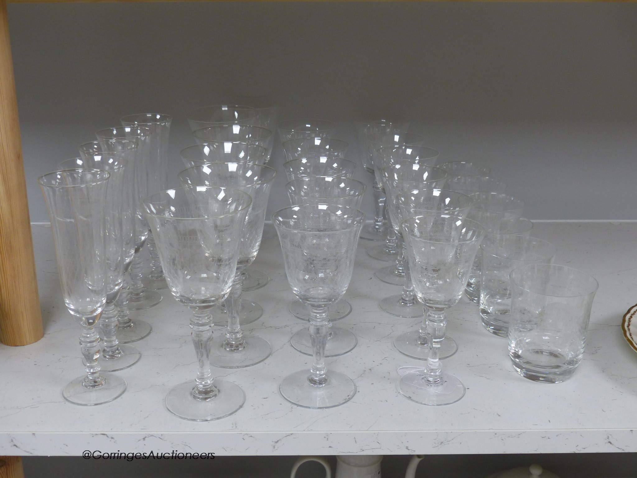 A suite of finely etched glassware, 23 pieces